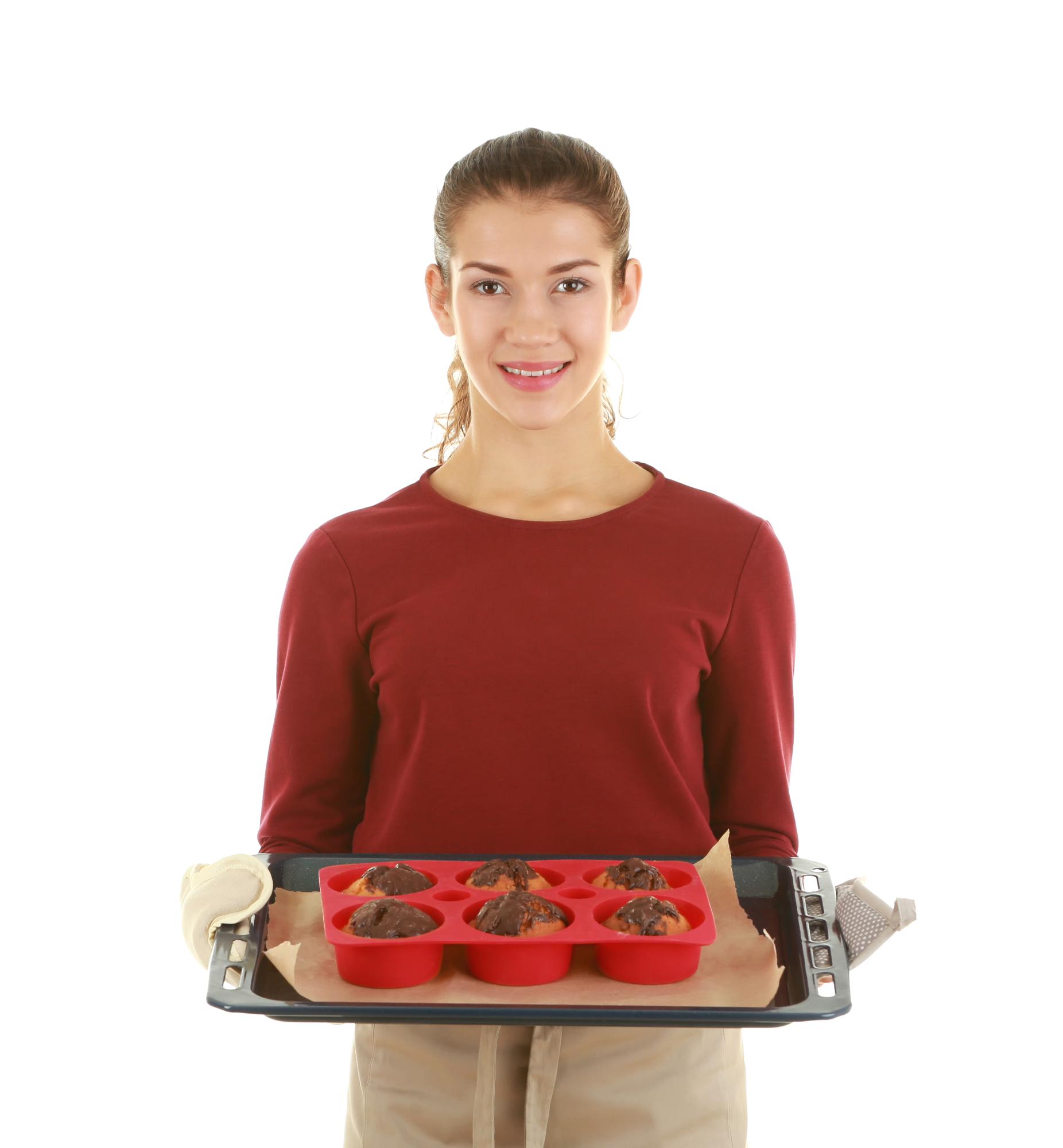 team member holding prepared catering tray