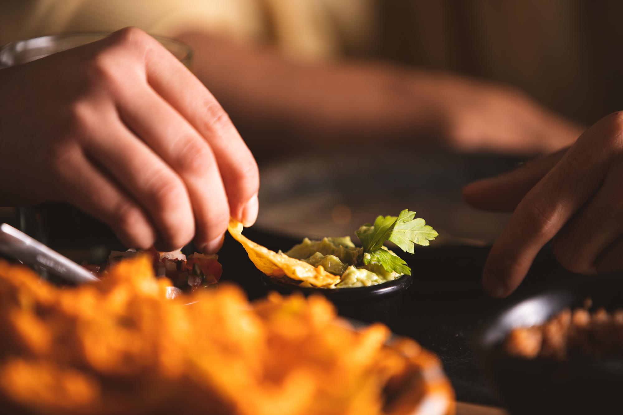 chef preparing plated food in warm kitchen